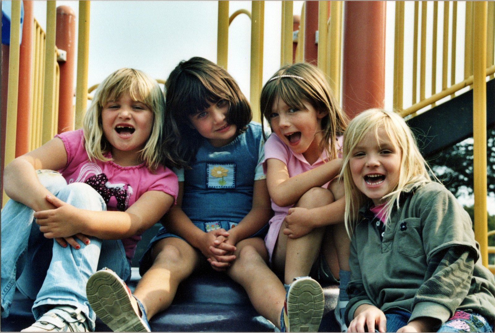 Group of four girls on a playground